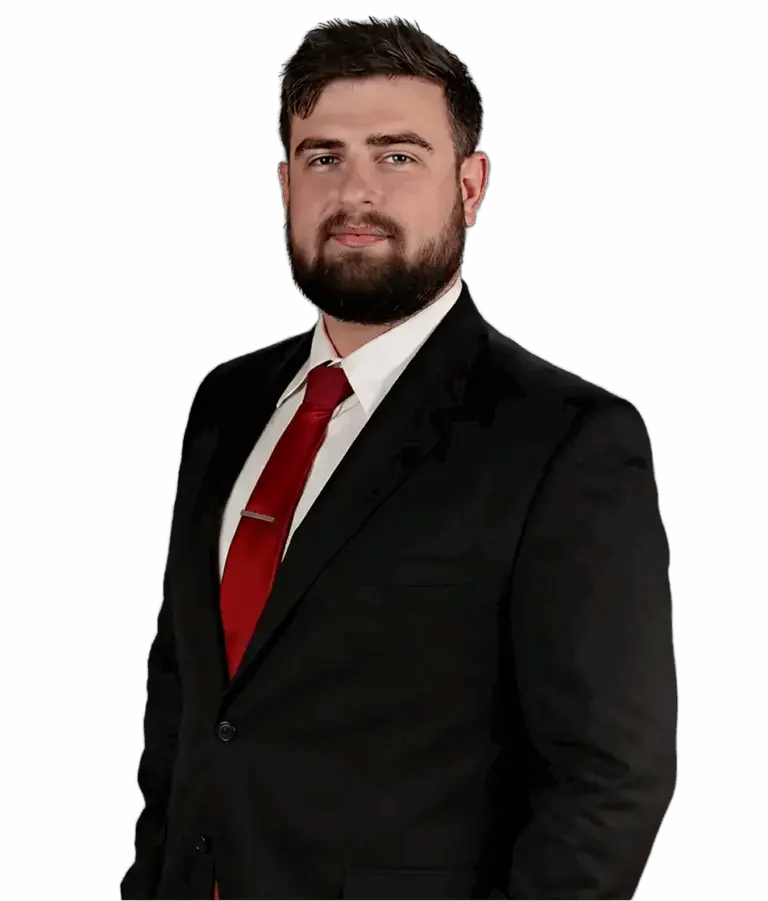 Portrait of Christian Brooks smiling confidently for professional profile photo.