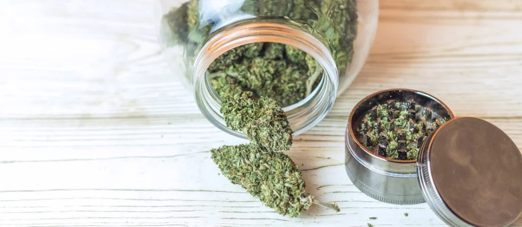 Marijuana pipe with cannabis for smoking and relaxation.