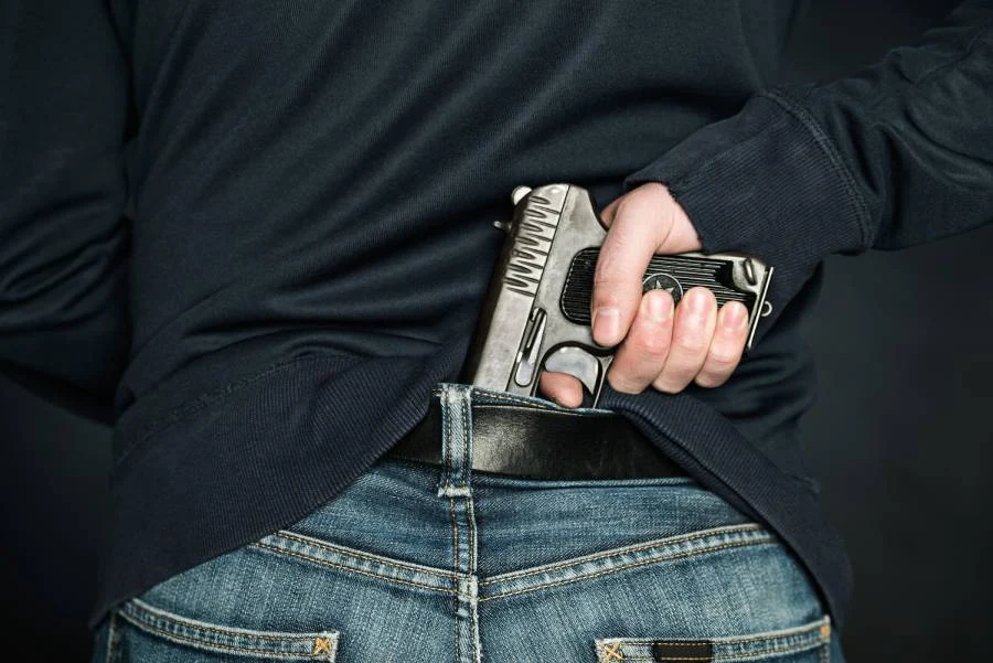 Legal regulations on firearms and weapon ownership in the United States.